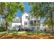 Exterior backyard view of a multi-story home, deck, and outdoor fire pit at 4082 Blackmoor St, Mount Pleasant, SC 29466