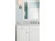 Bright bathroom featuring white cabinetry and a marble countertop at 4082 Blackmoor St, Mount Pleasant, SC 29466