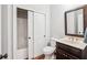 Cozy bathroom with wood floors and a cherry vanity at 4082 Blackmoor St, Mount Pleasant, SC 29466