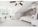 Upstairs bedroom with two beds, lots of light, desk and chair, and dormered nook at 4082 Blackmoor St, Mount Pleasant, SC 29466