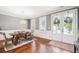 Dining room with natural light, a rustic wood table, and French doors leading outside at 4082 Blackmoor St, Mount Pleasant, SC 29466