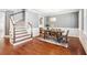 Dining room with staircase and a rustic wood table at 4082 Blackmoor St, Mount Pleasant, SC 29466