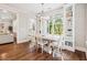Bright dining room featuring hardwood floors, large window, and stylish decor at 4082 Blackmoor St, Mount Pleasant, SC 29466
