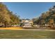 Stunning colonial-style home with grand columns and a spacious lawn at 4082 Blackmoor St, Mount Pleasant, SC 29466