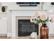 Living room fireplace with built-in shelving and a mounted TV above at 4082 Blackmoor St, Mount Pleasant, SC 29466