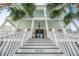 Inviting front porch with steps leading up to double doors and a hanging lantern at 4082 Blackmoor St, Mount Pleasant, SC 29466