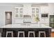 Kitchen boasts a large island, white cabinets, and stainless steel appliances, perfect for entertaining at 4082 Blackmoor St, Mount Pleasant, SC 29466