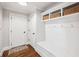 Entryway mudroom with bench, coat hooks, storage and hardwood floors at 4082 Blackmoor St, Mount Pleasant, SC 29466