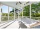 Inviting covered porch with hammock and ceiling fan at 4082 Blackmoor St, Mount Pleasant, SC 29466