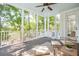 Relaxing screened porch with comfortable seating and serene outdoor views at 4082 Blackmoor St, Mount Pleasant, SC 29466