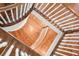 Unique birds-eye view of a spiral staircase with wooden steps at 4082 Blackmoor St, Mount Pleasant, SC 29466