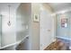 Upstairs hallway with lighting fixtures and linen closet at 409 Thoroughbred Dr, Moncks Corner, SC 29461