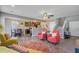 Spacious living room with hardwood floors, and open layout to kitchen at 409 Thoroughbred Dr, Moncks Corner, SC 29461