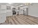 Updated kitchen featuring stainless steel appliances, sleek countertops, and modern lighting fixtures at 415 Parkdale Dr # 2B, Charleston, SC 29414