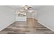 Spacious living area with hardwood floors and a kitchen featuring stainless steel appliances at 415 Parkdale Dr # 2B, Charleston, SC 29414