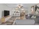 Open concept living space with a view of kitchen, dining area, and comfortable seating at 415 Parkdale Dr # 2B, Charleston, SC 29414