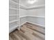 Spacious walk-in closet featuring ample shelving and storage space to meet all wardrobe needs at 415 Parkdale Dr # 2B, Charleston, SC 29414