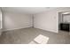 Spacious bedroom featuring neutral carpet and trim, with an en-suite bathroom at 4996 Song Sparrow Way, Summerville, SC 29483