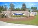 Community entrance with brick sign at 4996 Song Sparrow Way, Summerville, SC 29483