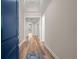 Welcoming hallway featuring wood floors and an open floor plan at 4996 Song Sparrow Way, Summerville, SC 29483