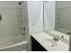 Bright bathroom with a tub and shower combo, features a vanity and plenty of counter space at 5226 Fernland Way, North Charleston, SC 29420