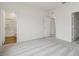 Spacious bedroom with plush carpeting and easy access to an attached bathroom at 544 Pender Woods Dr, Summerville, SC 29486