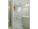 Traditional bathroom with tiled floors, shower, and a vanity at 5569 Frisco Ln, Johns Island, SC 29455