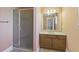 Bathroom with glass enclosed shower, single sink vanity and ceramic tile flooring at 5569 Frisco Ln, Johns Island, SC 29455