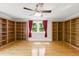 Spacious bedroom featuring hardwood floors and built in bookshelves, a reader's paradise! at 5569 Frisco Ln, Johns Island, SC 29455