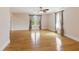Bright bedroom featuring hardwood floors, ceiling fan and natural light at 5569 Frisco Ln, Johns Island, SC 29455