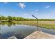 Pier view of marshlands and waterways with blue skies at 5569 Frisco Ln, Johns Island, SC 29455
