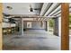 Spacious two car garage with concrete flooring, cinder block walls, and an installed automatic door opener at 5569 Frisco Ln, Johns Island, SC 29455