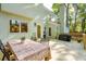 The backyard's deck provides a dining area with a grill, perfect for outdoor gatherings at 595 Crowned Kinglet Retreat, Charleston, SC 29412