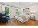 Bedroom with hardwood floors and comfortable furnishings at 595 Crowned Kinglet Retreat, Charleston, SC 29412