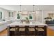 Bright, spacious kitchen featuring a large island with bar seating and modern stainless appliances at 595 Crowned Kinglet Retreat, Charleston, SC 29412