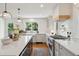 A kitchen featuring stainless steel appliances and a center island with plenty of counter space at 595 Crowned Kinglet Retreat, Charleston, SC 29412