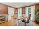 Stylish office space with large windows, hardwood floors, and natural light at 595 Crowned Kinglet Retreat, Charleston, SC 29412