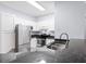 Modern kitchen featuring stainless steel appliances, granite countertops, and white cabinetry, perfect for culinary enthusiasts at 60 Fenwick Hall Allee # 321, Johns Island, SC 29455