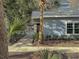 Exterior view of the community fitness center with pool access, surrounded by palm trees and landscaping at 60 Fenwick Hall Allee # 321, Johns Island, SC 29455