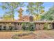 Brick home featuring a cozy backyard perfect for outdoor activities at 7 Andrea Ct, Hanahan, SC 29410