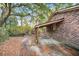 Home exterior featuring a covered carport with brick and wood trim at 7 Andrea Ct, Hanahan, SC 29410