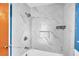 Bathroom featuring a marble tiled shower, bronze fixtures, and built in niche at 7 Andrea Ct, Hanahan, SC 29410