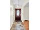 Inviting entryway features stylish tile flooring and a decorative front door at 7 Andrea Ct, Hanahan, SC 29410
