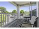 Relaxing outdoor balcony with a patterned rug and comfortable seating, perfect for enjoying the views at 700 Daniel Ellis Dr # 10307, Charleston, SC 29412