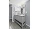 Bathroom with a double vanity and grey walls at 700 Daniel Ellis Dr # 10307, Charleston, SC 29412