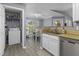 Open floor plan: combination kitchen, dining and laundry area at 700 Daniel Ellis Dr # 10307, Charleston, SC 29412