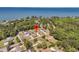 Aerial view of a waterfront property with lush greenery, showcasing its prime location and neighborhood at 707 Butter Rd, Bonneau, SC 29431