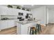 Bright kitchen with granite countertops, stainless steel appliances, and an island at 707 Butter Rd, Bonneau, SC 29431