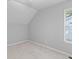 Minimalist bedroom with neutral paint, carpet flooring, and natural light provides a comfortable and serene space at 715 Majestic Oak Dr, Charleston, SC 29412