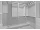 Bright walk-in closet featuring custom shelving, hanging rods, and white trim at 715 Majestic Oak Dr, Charleston, SC 29412